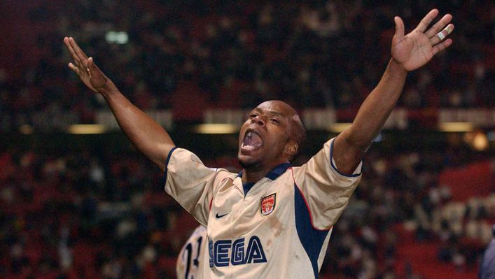 Arsenal striker Sylvain Wiltord celebrates after winning the Premier League title for the Gunners at Old Trafford