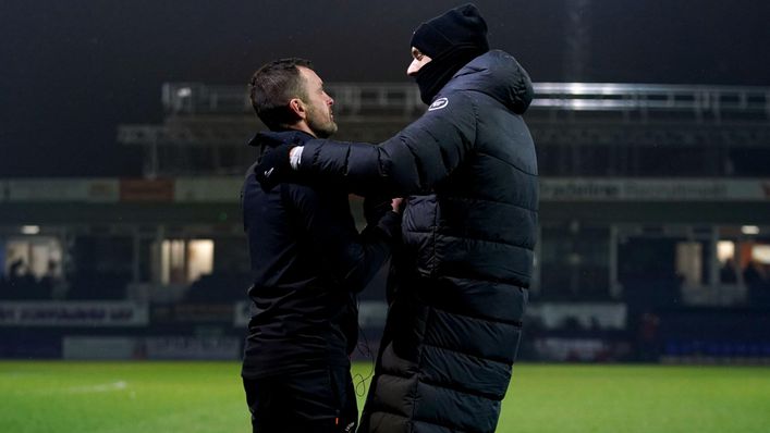 Luton boss Nathan Jones with Thomas Tuchel after the match at Kenilworth Road