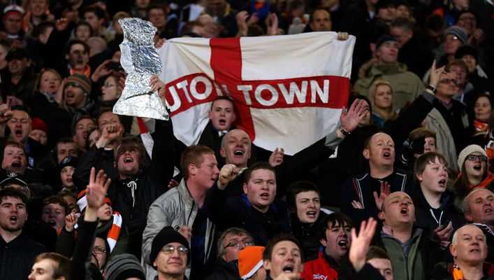 Luton Town fans celebrate after their non-league heroes downed Premier League Norwich