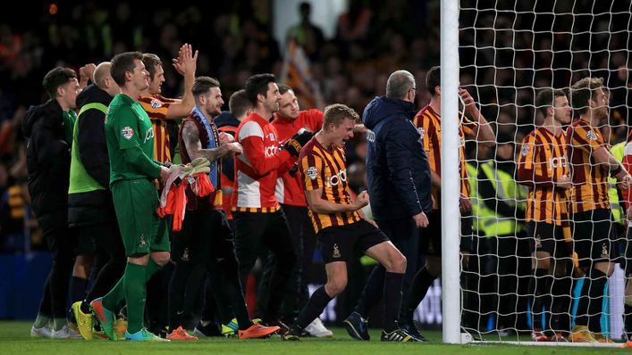 Bradford City's players and staff celebrate after causing one of the all-time great upsets against Chelsea in 2015