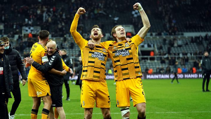 Cambridge celebrate after a famous upset at Newcastle