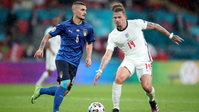 Kalvin Phillips does battle with Italy midfielder Marco Verratti