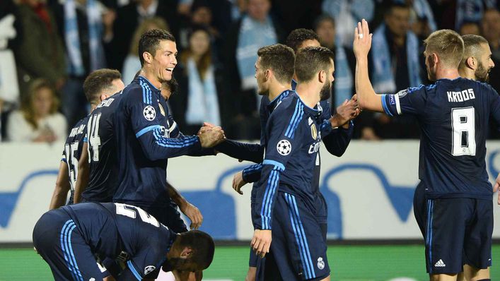 Cristiano Ronaldo is congratulated by his Real Madrid team-mates after grabbing his 500th career goal