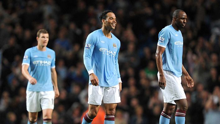 Joleon Lescott (centre) believes friend and former team-mate Patrick Vieira faces a tough first league match in charge of Crystal Palace