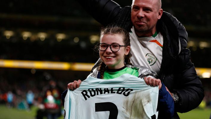 Young fan Addison Whelan proudly shows off Cristiano Ronaldo's shirt