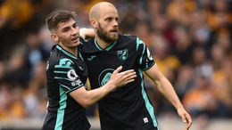 Billy Gilmour embraces Teemu Pukki after the striker's opening goal