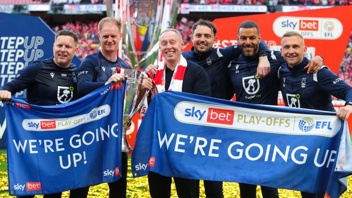 Nottingham Forest boss Steve Cooper celebrates promotion to the Premier League with his coaching staff