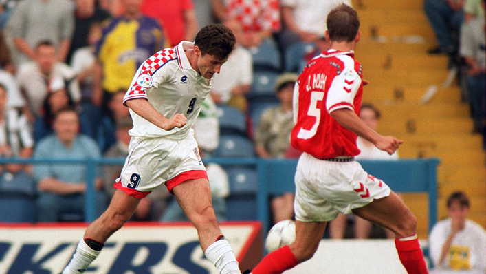 Davor Suker lifts the ball over Peter Schmeichel with a deft left-footed finish