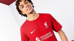 Trent Alexander-Arnold models Liverpool's new home shirt for the 2022-23 season