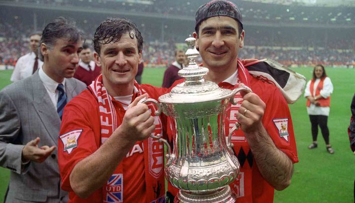 Eric Cantona (right) was a key figure in United's success in the early 1990s