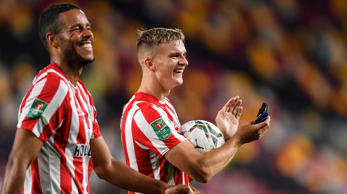 Finnish forward Marcus Forss celebrates with the match ball after his four goals against Oldham