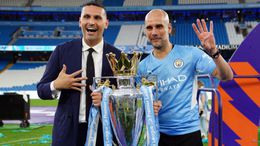 Pep Guardiola celebrates after Manchester City won their fourth title in five years
