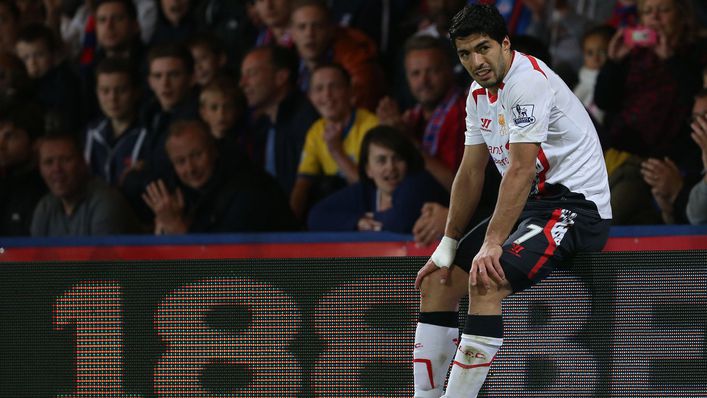 Luis Suarez was left desolate after seeing the title begin to slip through Liverpool's grasp