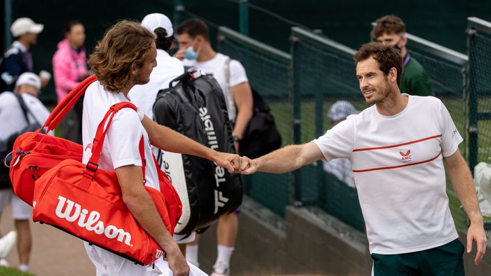 Andy Murray (right) returns to Wimbledon today