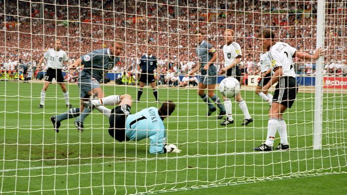 Alan Shearer scores the opening goal of the game for England