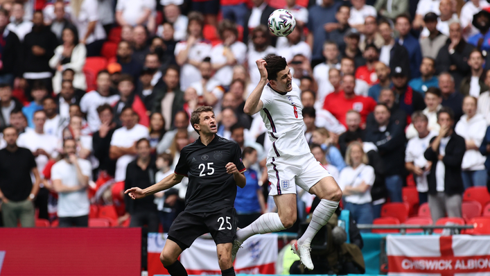 Harry Maguire gets up to beat Thomas Muller to an aerial duel in the opening 45 minutes