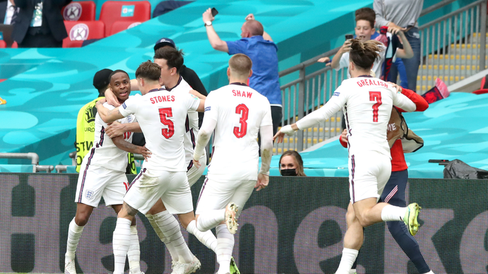 England's players celebrate Raheem Sterling's 75th-minute opener at Wembley