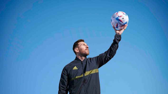 Lionel Messi with the the official 2022 World Cup match ball